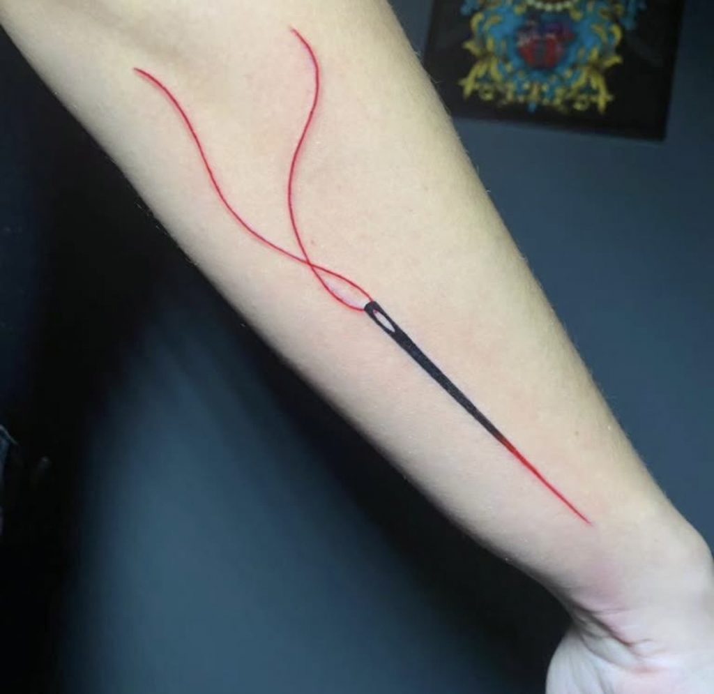 TATUAJE FINE LINE NEGRO MARFIL ESTUDIO TATUAJES MADRID